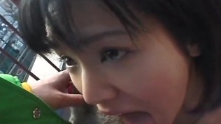 Lovely Japanese babe sucks a hard dick outdoors