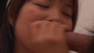 Precious Asian brunette has a fat dick she is sucking on