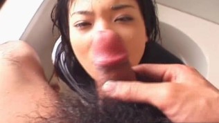 Young Japanese schoolgirl gives her first blowjob